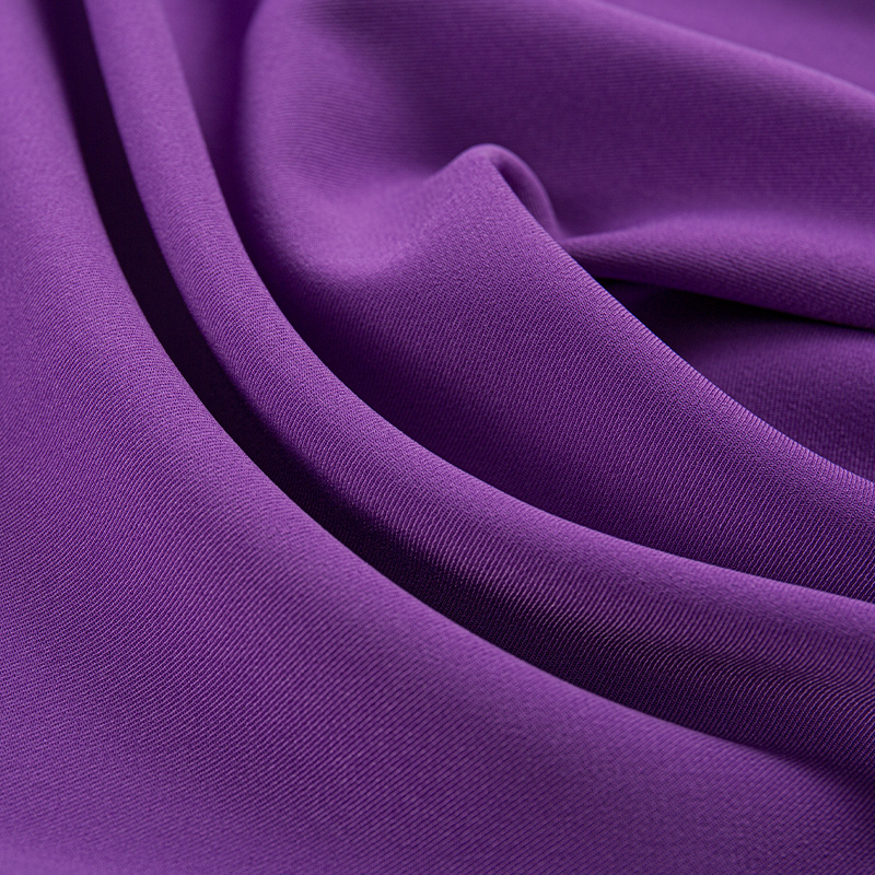 HY070 Tessuto per abbigliamento in twill 2/2 elasticizzato a trama composita viola