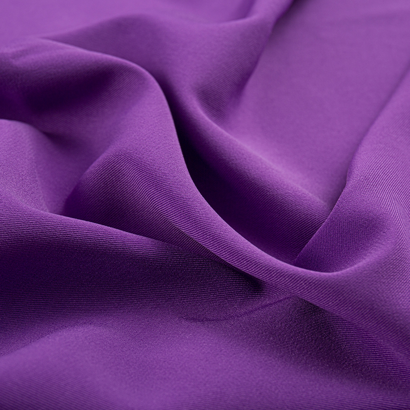 HY070 Tessuto per abbigliamento in twill 2/2 elasticizzato a trama composita viola